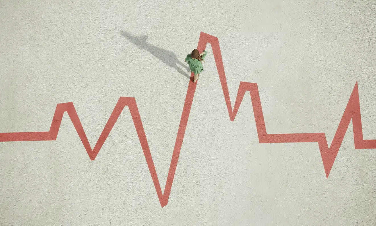 Woman walking on painted pulse trace graph image