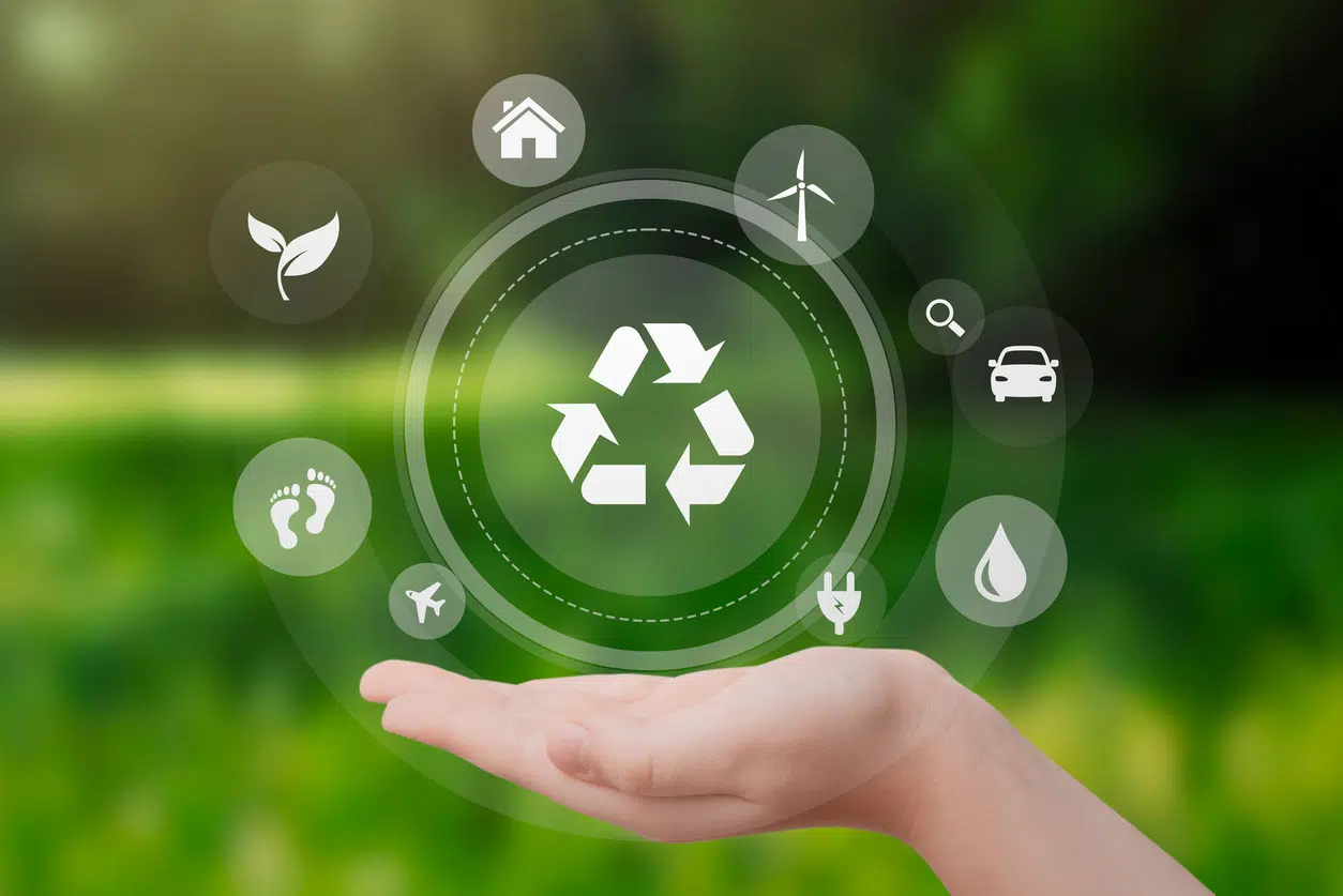 Hand with recycling and eco symbols image