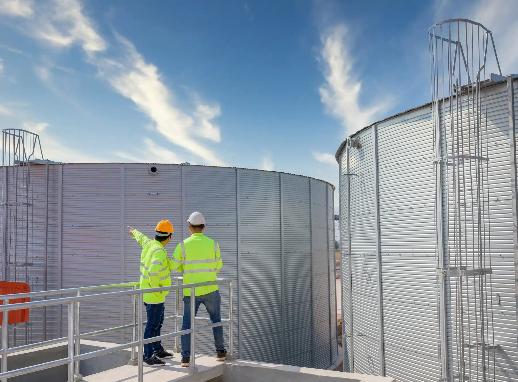 2 workmen at utilities plant image