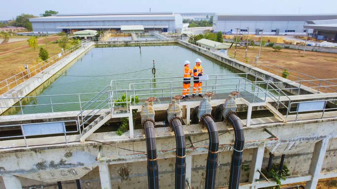 Two Environmental engineers at wastewater treatment plants image