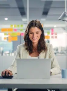 Woman using Laptop image