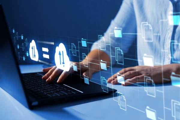 person on laptop with abstract graphics icon image