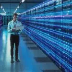 man in server room image