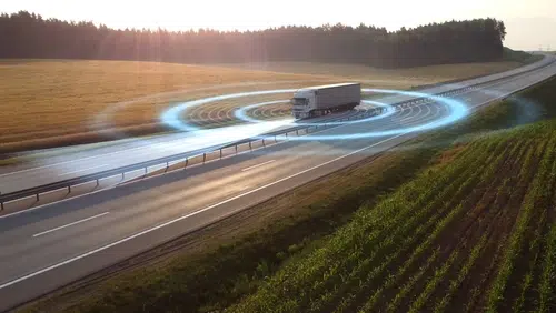 truck on empty road by fields with surrounding circles image