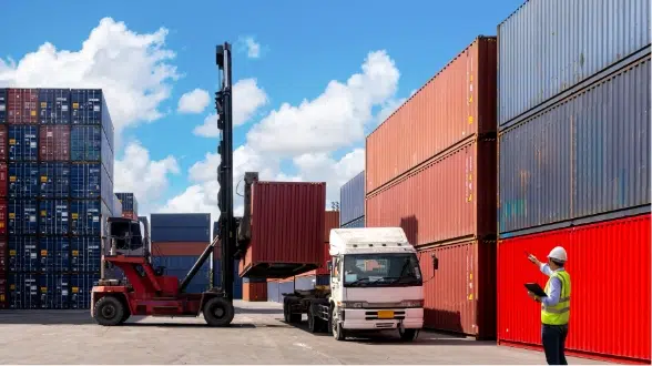 truck loading container at port image