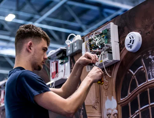 man fixing circuit board image