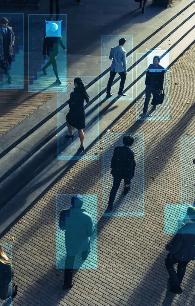 people on street each in a blue graphics box image