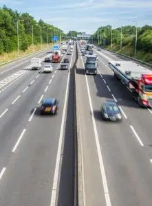 fast cars on motorway blurred image