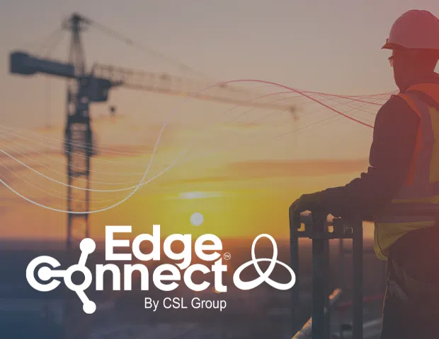 EdgeConnect Logo in white, over background image of a Construction site with sunset.