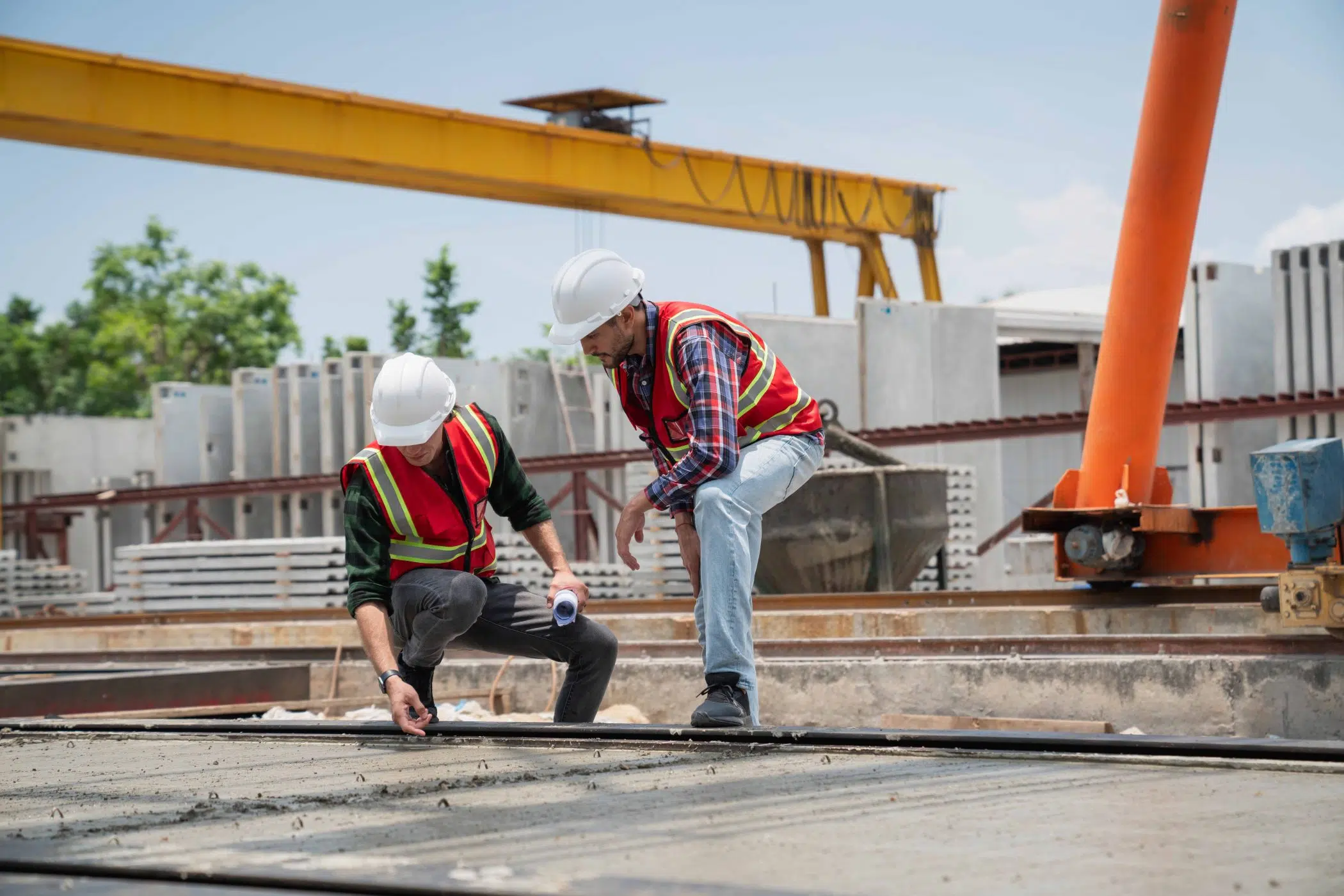 engineer-or-architect-with-a-hardhat-examines-the-concrete