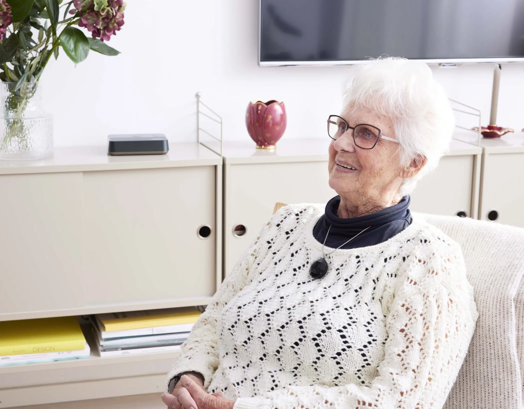 Careium Pendant User Older Woman wearing telecare device