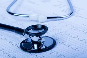 Stethoscope and EKG traces